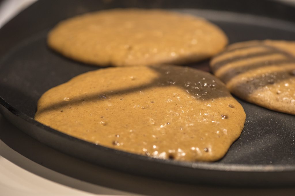 When the batter starts to bubble up, check the bottom until each  pancakes is lightly browned.